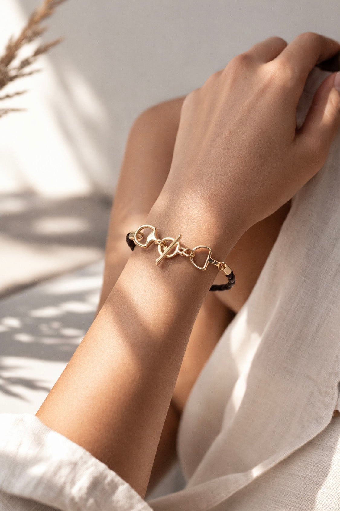 Double Horsebit Toggle Braided Leather Cord Bracelet